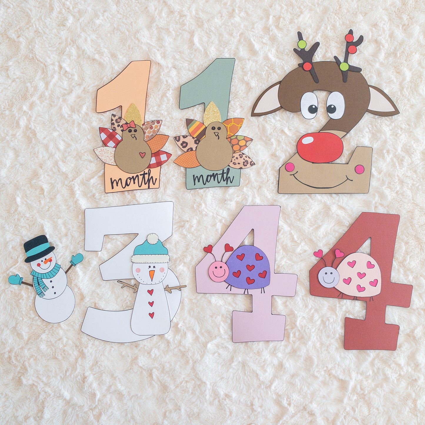 Milestone numbers for taking baby’s picture each month of their first year 