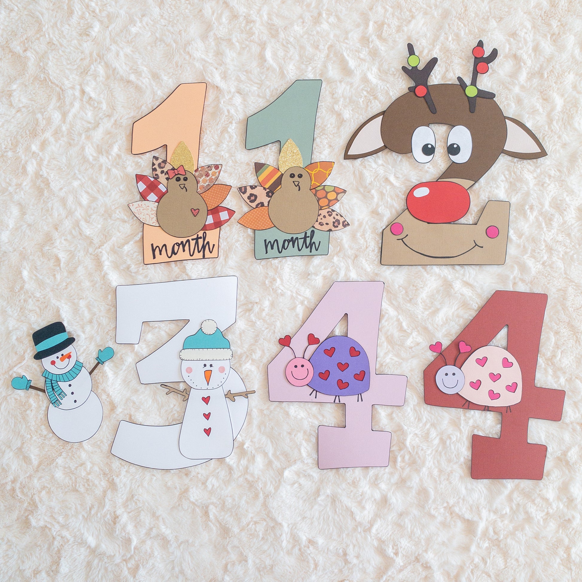 Milestone numbers for taking baby’s picture each month of their first year 
